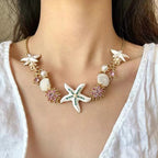 Collier perles, coquillage et étoile de mer