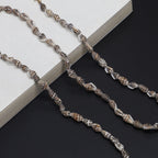 Chaîne de lunettes inspirée des coquillages