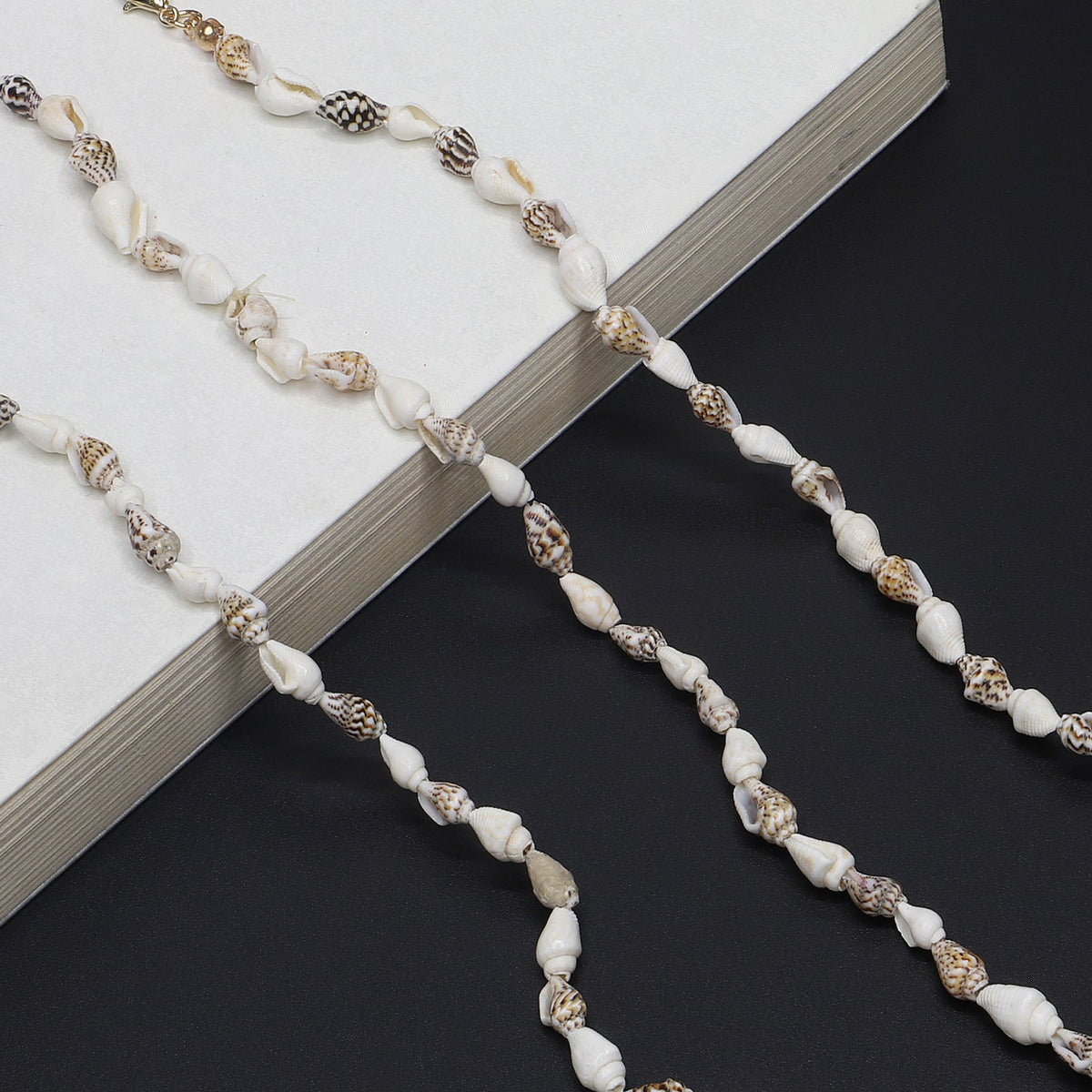 Chaîne de lunettes inspirée des coquillages