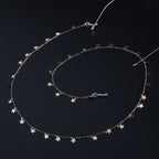 Chaîne de lunettes décorée d'étoiles