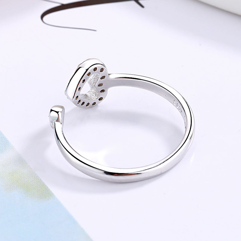 Bague ouverte pour femme avec cœur scintillant