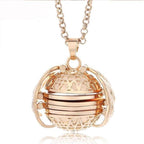 Collier médaillon ailes d'ange