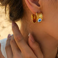 Boucles d'Oreilles Créoles Texturées Mauvais Œil 18k