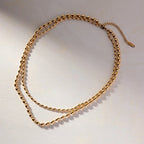 Collier superposé de perles dorées 18k