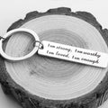 Porte-clés en acier inoxydable "I am strong"