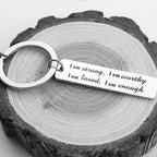 Porte-clés en acier inoxydable "I am strong"