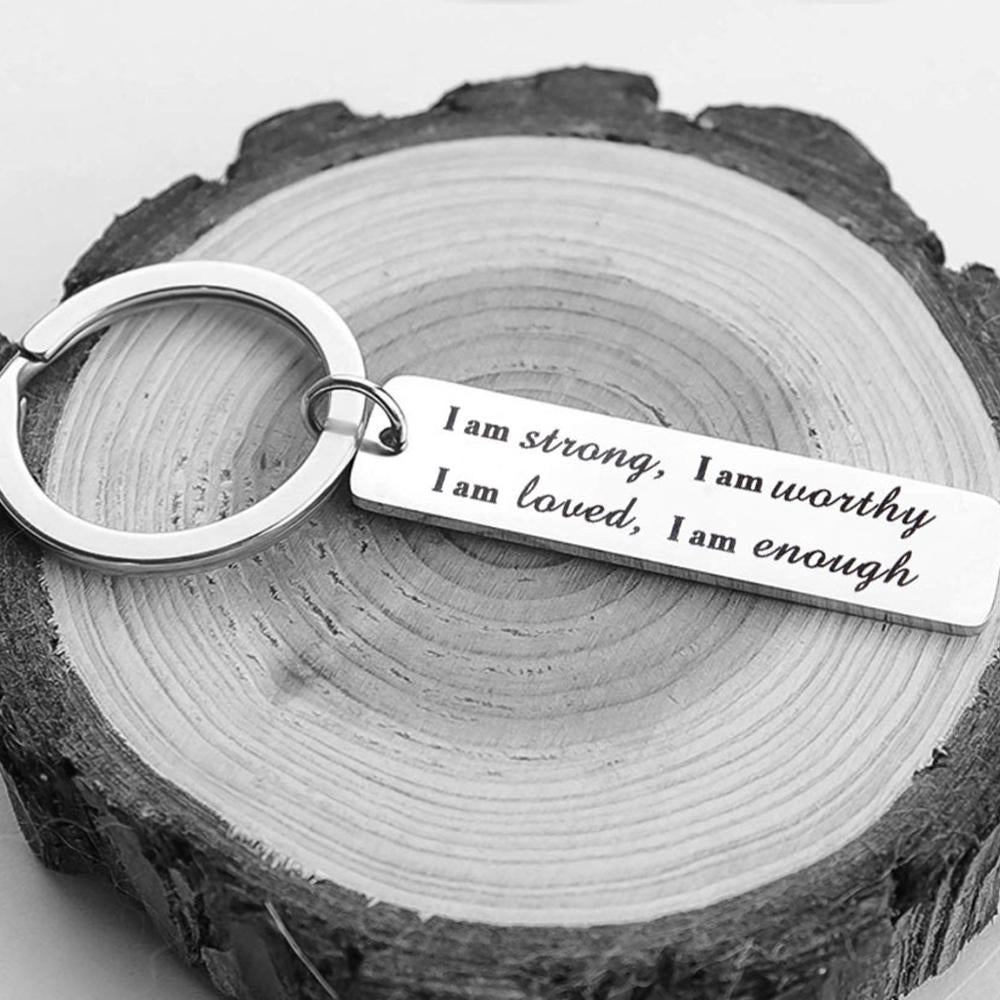 Porte-clés en acier inoxydable "I am strong"