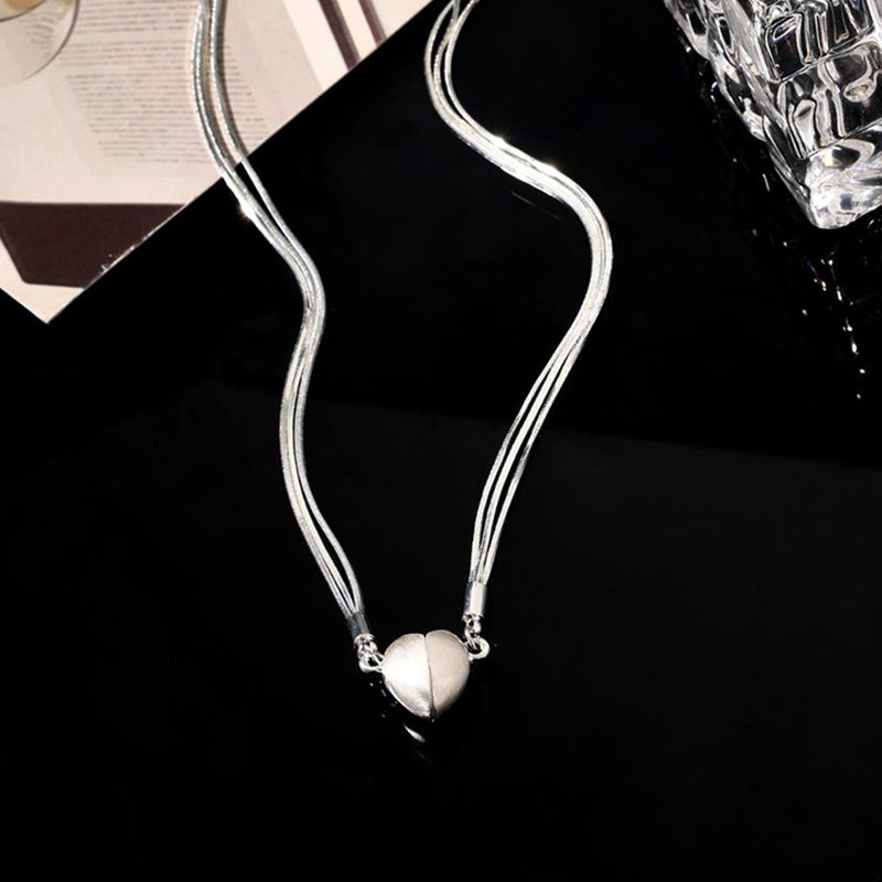 Collier avec pendentif cœur magnétique