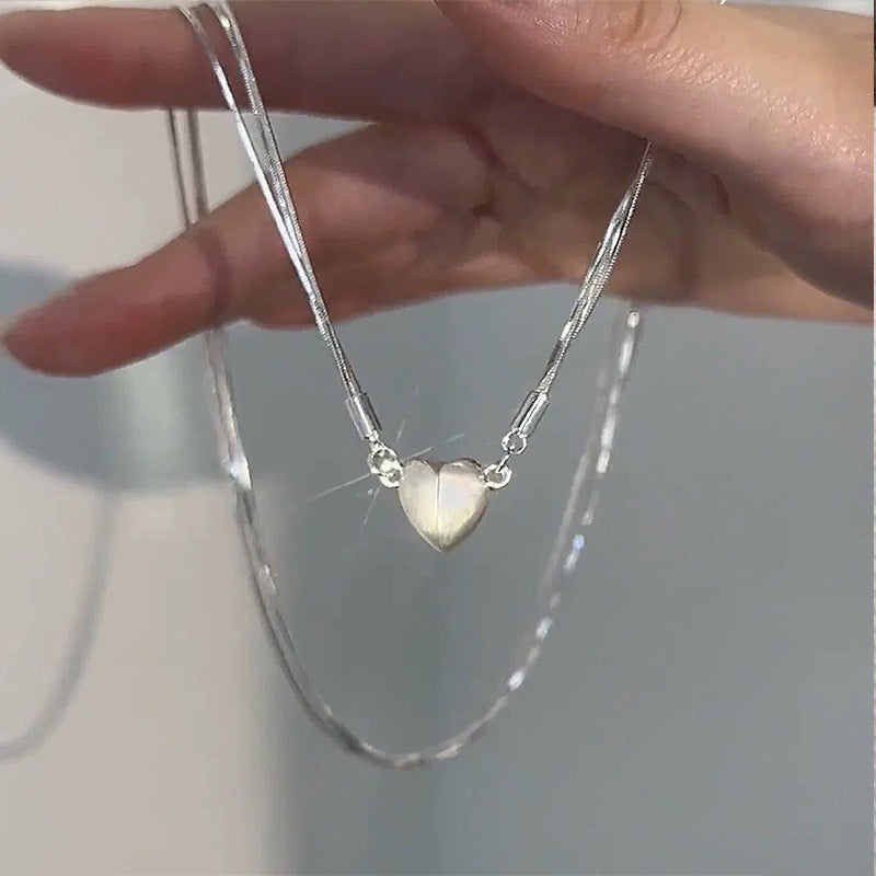 Collier avec pendentif cœur magnétique