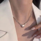 Collier avec pendentif cœur magnétique