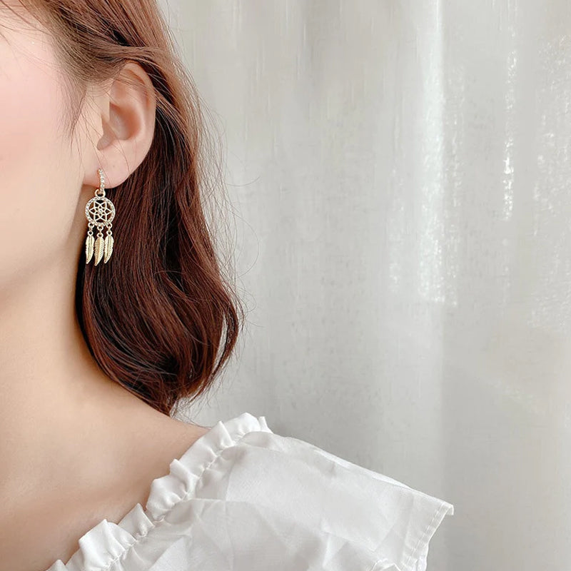 Boucles d'oreilles attrape-rêves avec cristal