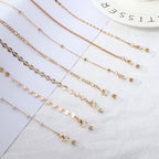 Collier avec perles et pendentifs transparents