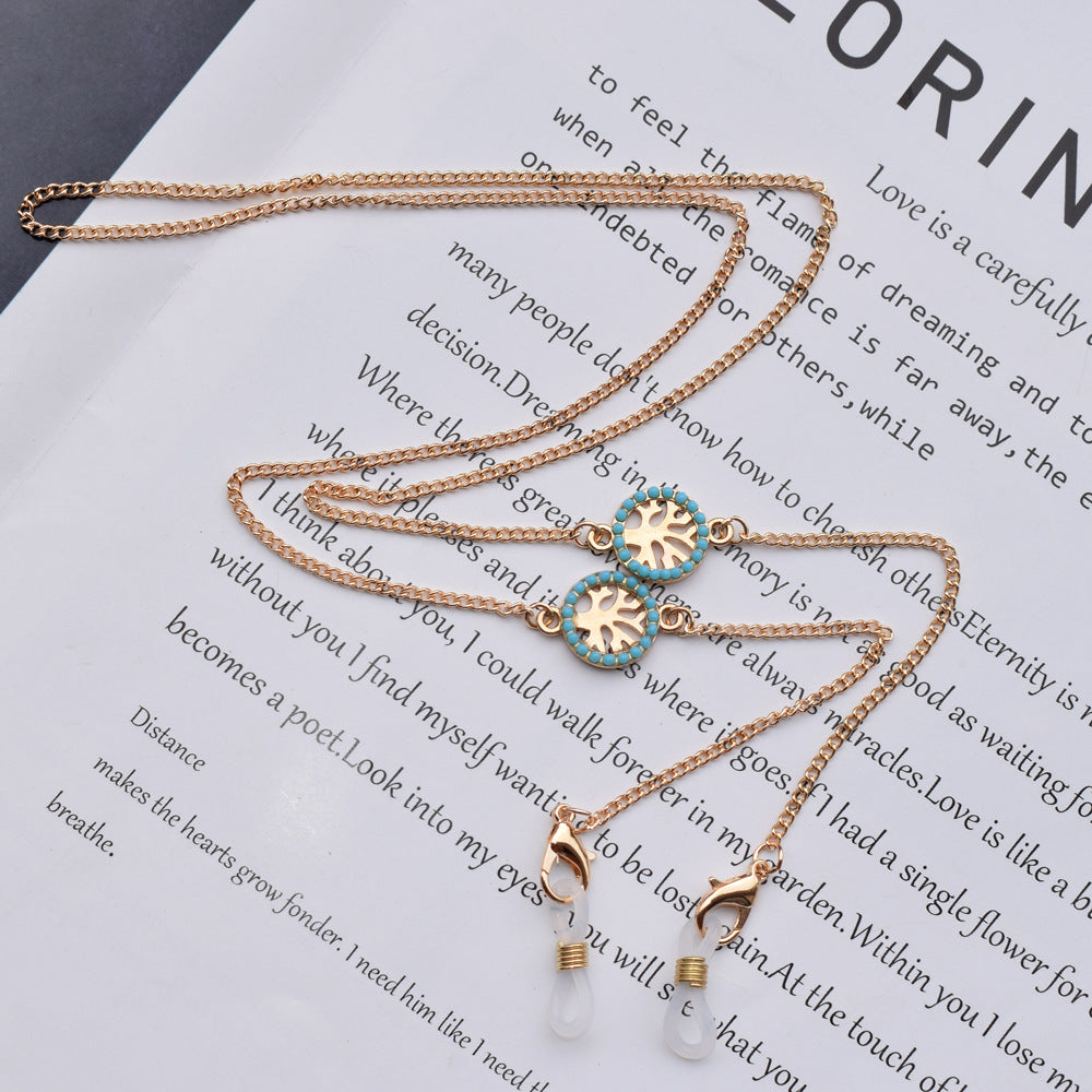 Collier à chaînes superposées et pendentifs