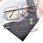 Collier à chaînes superposées et pendentifs