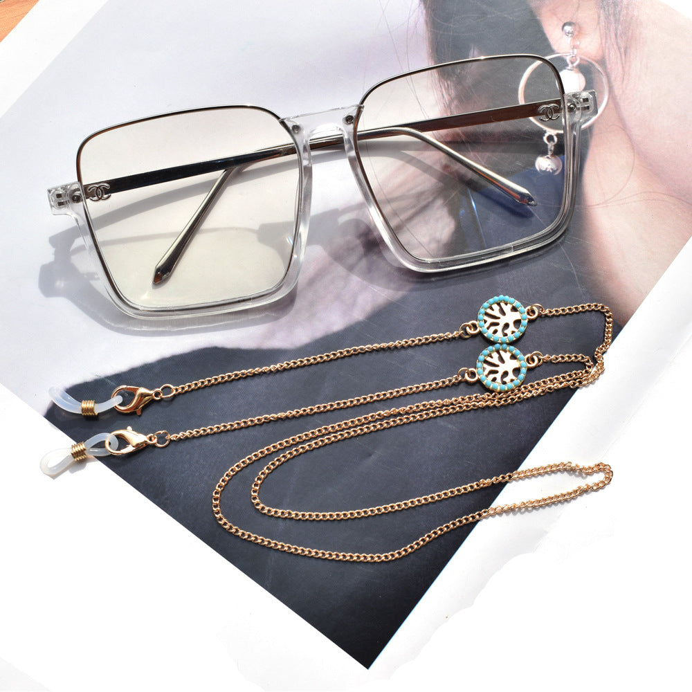 Collier à chaînes superposées et pendentifs