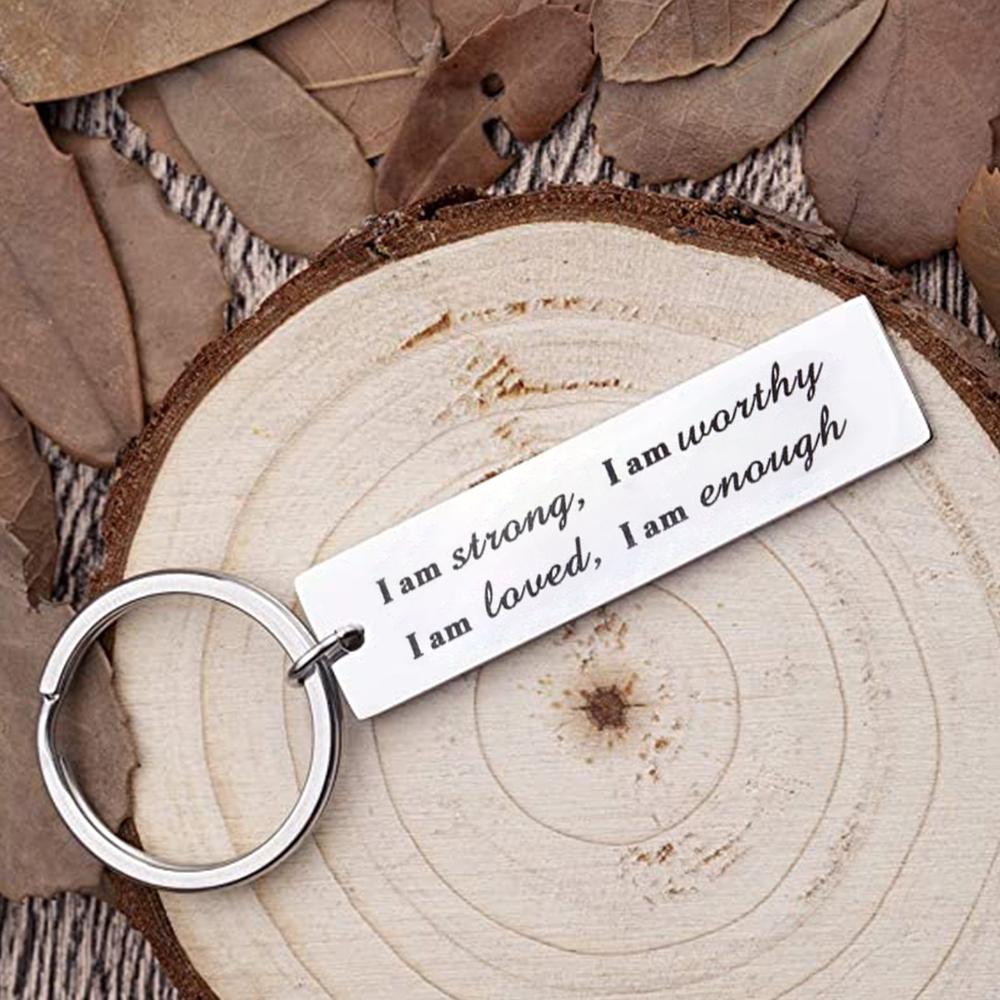 Porte-clés en acier inoxydable "I am strong"