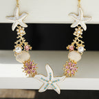 Collier perles, coquillage et étoile de mer