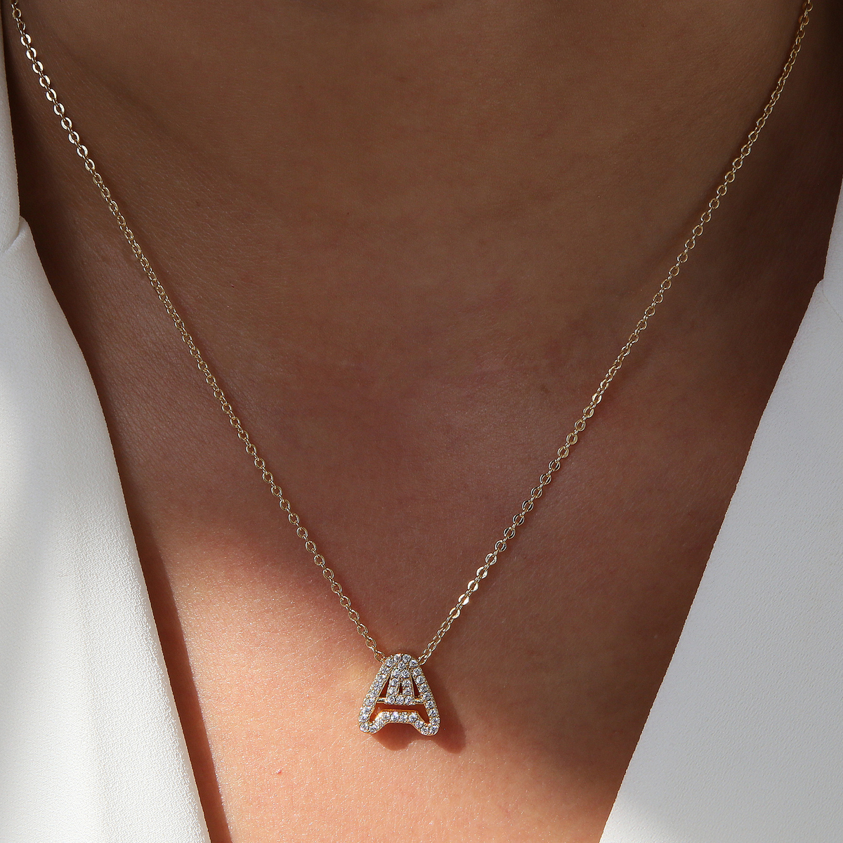 Collier initiale diamant