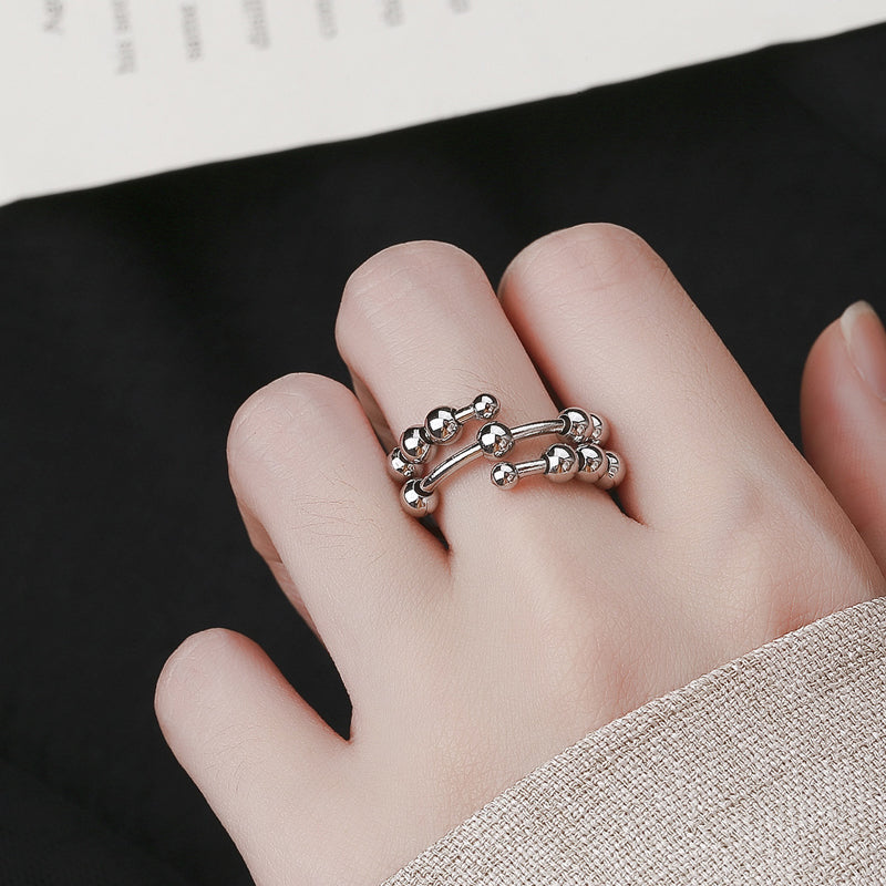 Bague anti-stress à perles circulaires