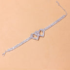 Chevillère double cœur en strass