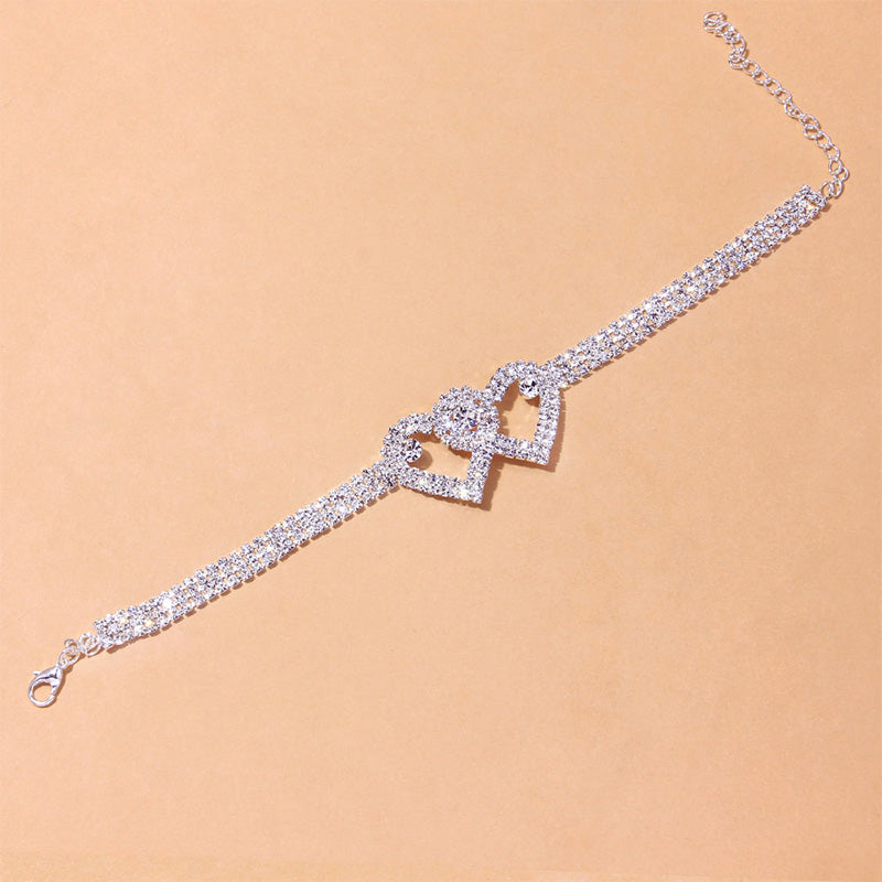 Chevillère double cœur en strass
