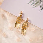 Boucles d'oreilles attrape-rêves avec cristal