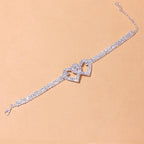 Chevillère double cœur avec strass