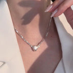 Collier avec pendentif cœur magnétique