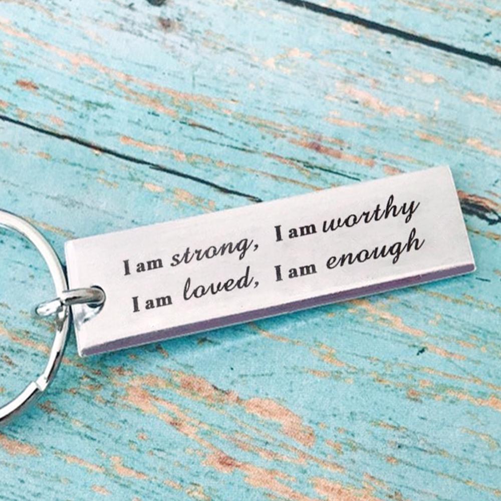 Porte-clés en acier inoxydable "I am strong"