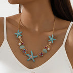 Collier perles, coquillage et étoile de mer
