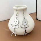 Boucles d'oreilles Doodle amusantes