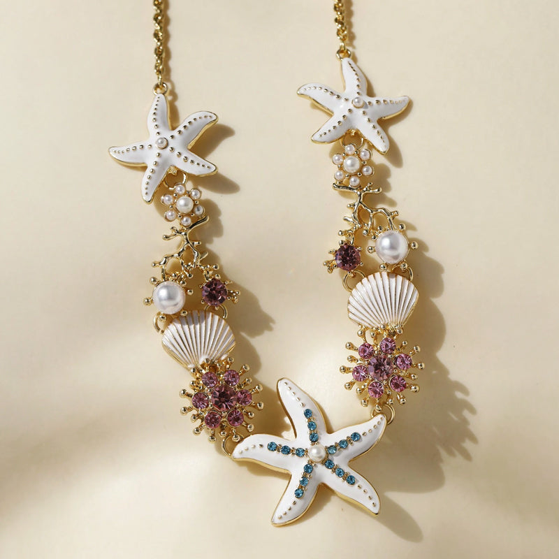 Collier perles, coquillage et étoile de mer