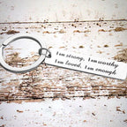 Porte-clés en acier inoxydable "I am strong"