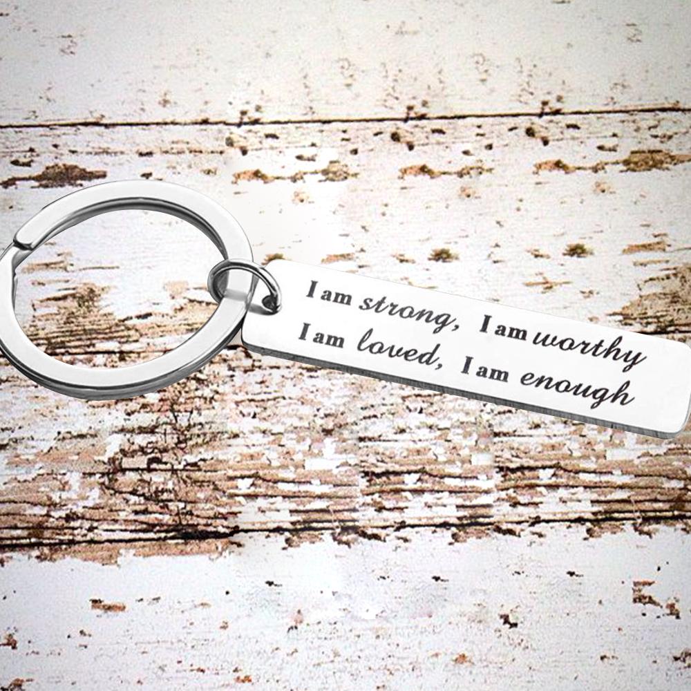 Porte-clés en acier inoxydable "I am strong"