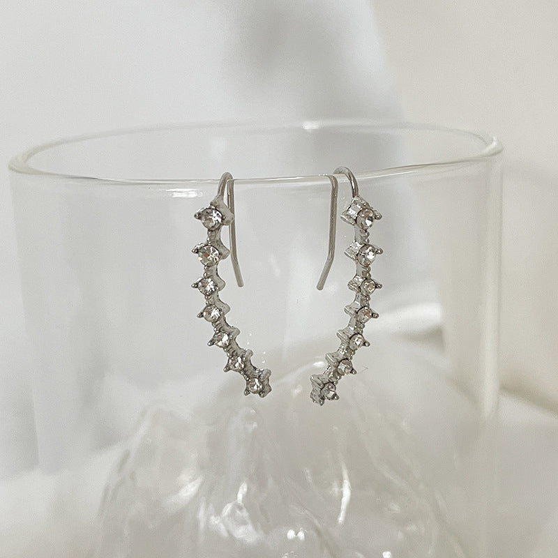 Boucles d'oreilles puces sept étoiles