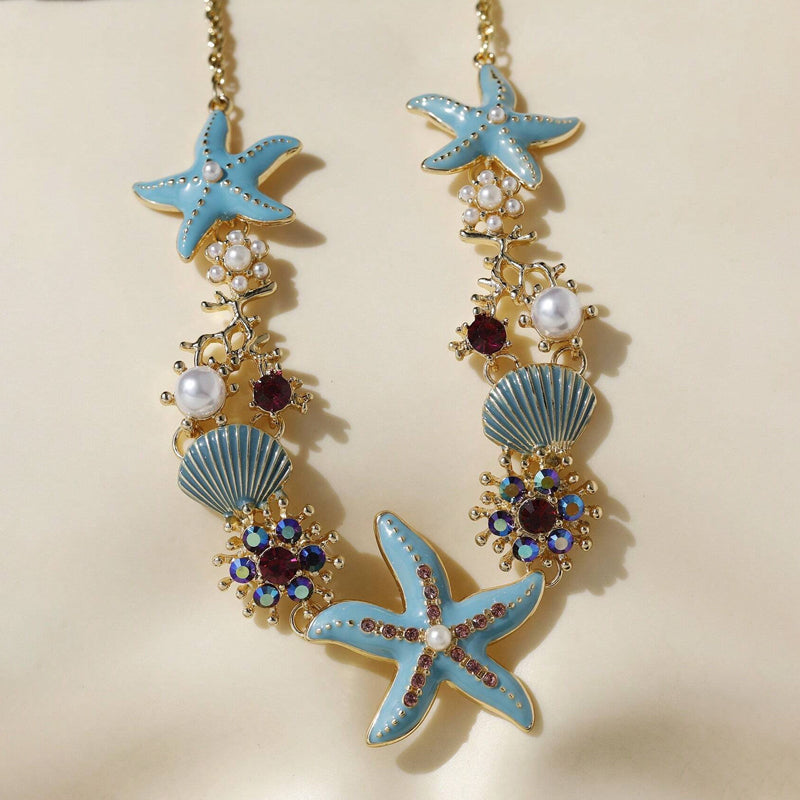 Collier perles, coquillage et étoile de mer