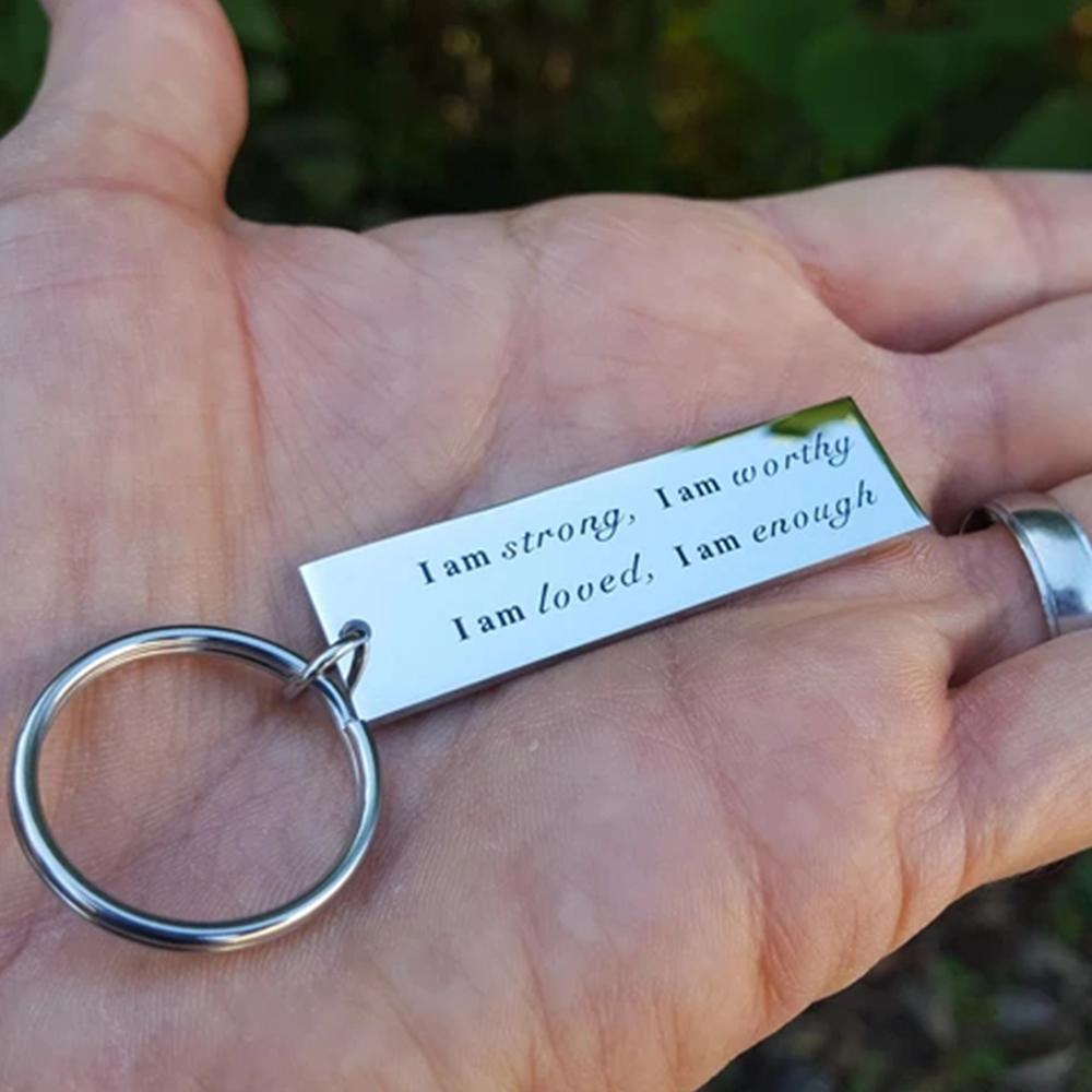 Porte-clés en acier inoxydable "I am strong"