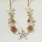 Collier perles, coquillage et étoile de mer