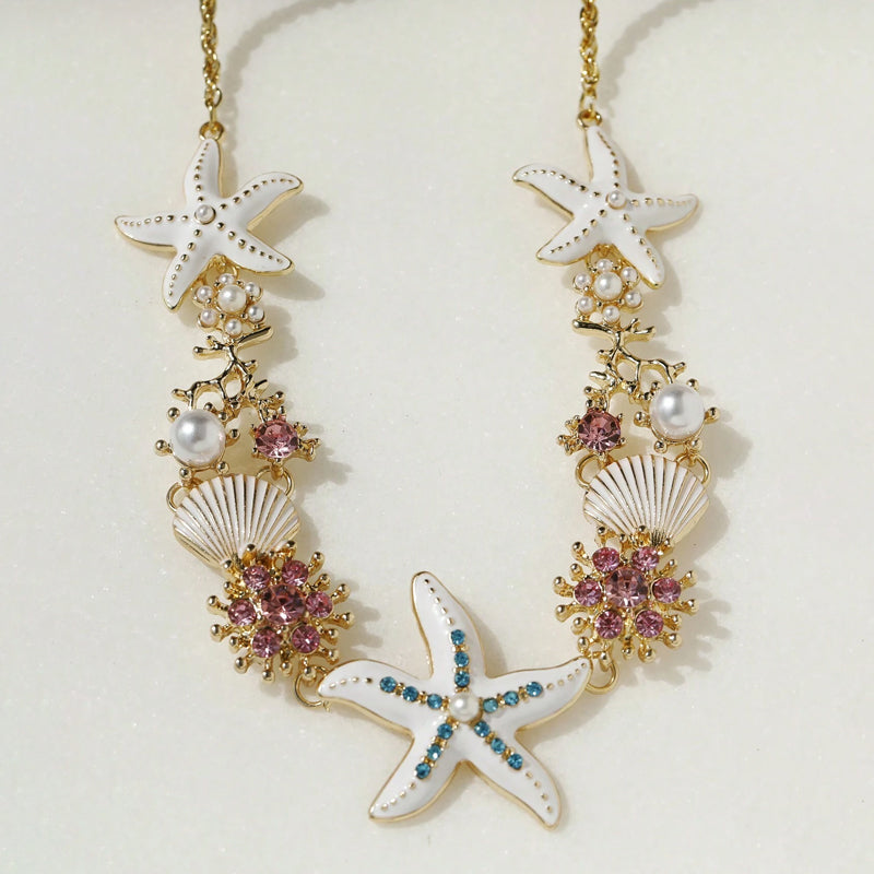 Collier perles, coquillage et étoile de mer
