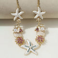 Collier perles, coquillage et étoile de mer