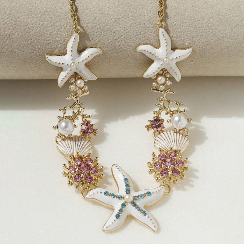 Collier perles, coquillage et étoile de mer