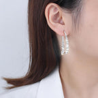 Boucles d'oreilles croisées tendance