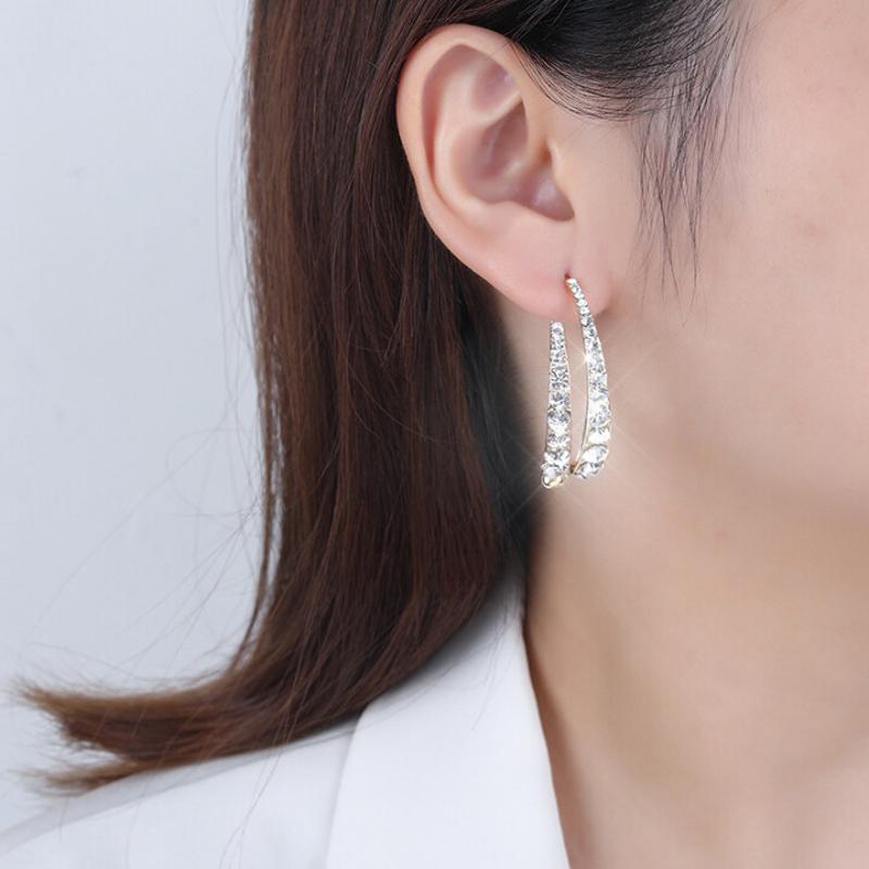 Boucles d'oreilles croisées tendance
