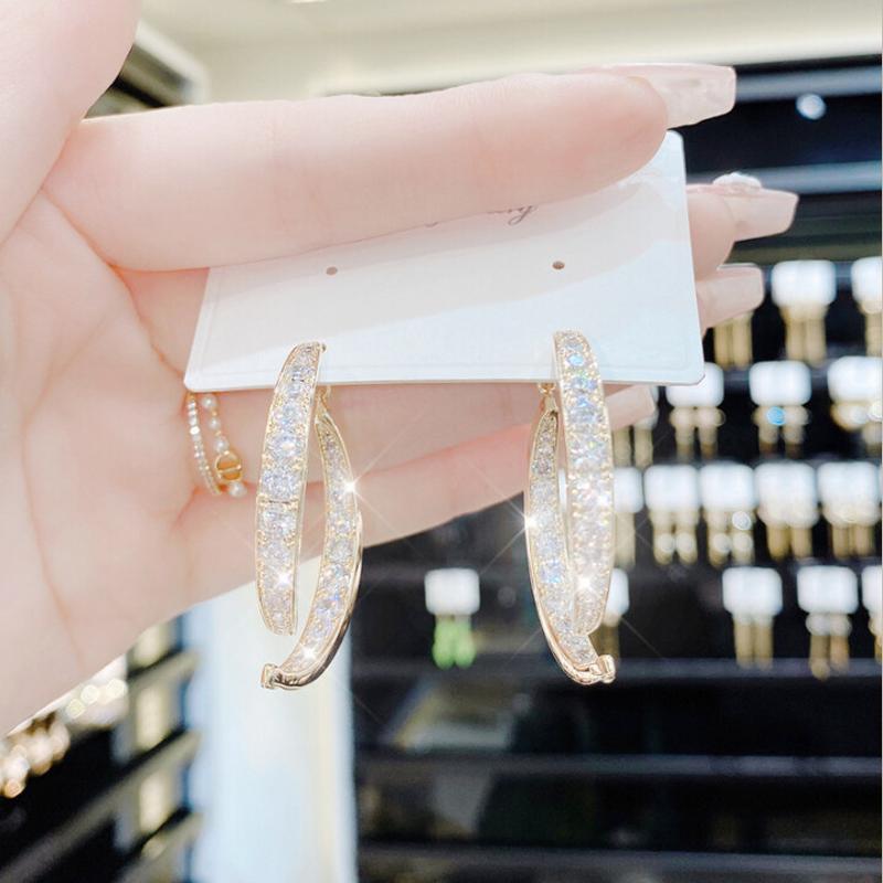 Boucles d'oreilles croisées tendance