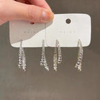 Boucles d'oreilles croisées tendance