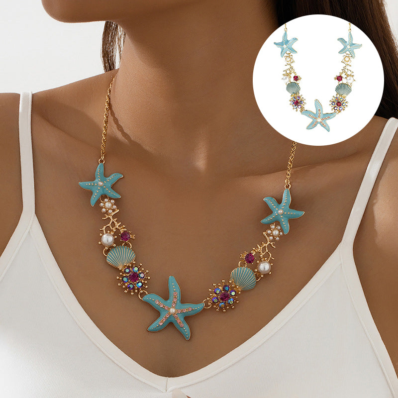 Collier perles, coquillage et étoile de mer