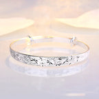 Bracelet argenté en forme d'étoile