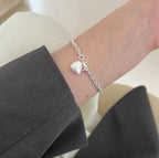 Bracelet pour femme avec pendentif cœur en acier inoxydable