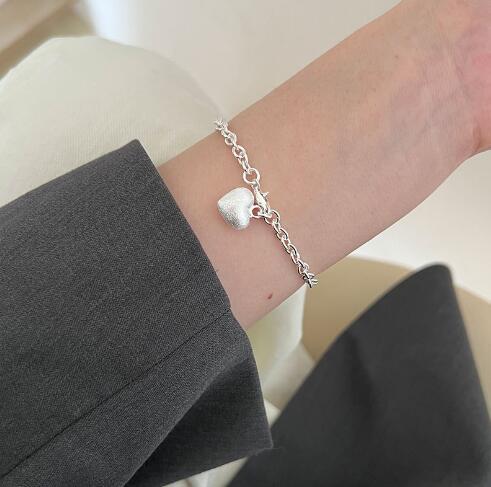 Bracelet pour femme avec pendentif cœur en acier inoxydable