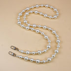Collier élégant perles et chaîne